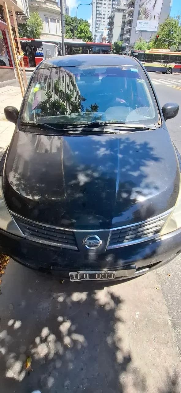 Nissan Tiida 2009 1.8 TEKNA седан