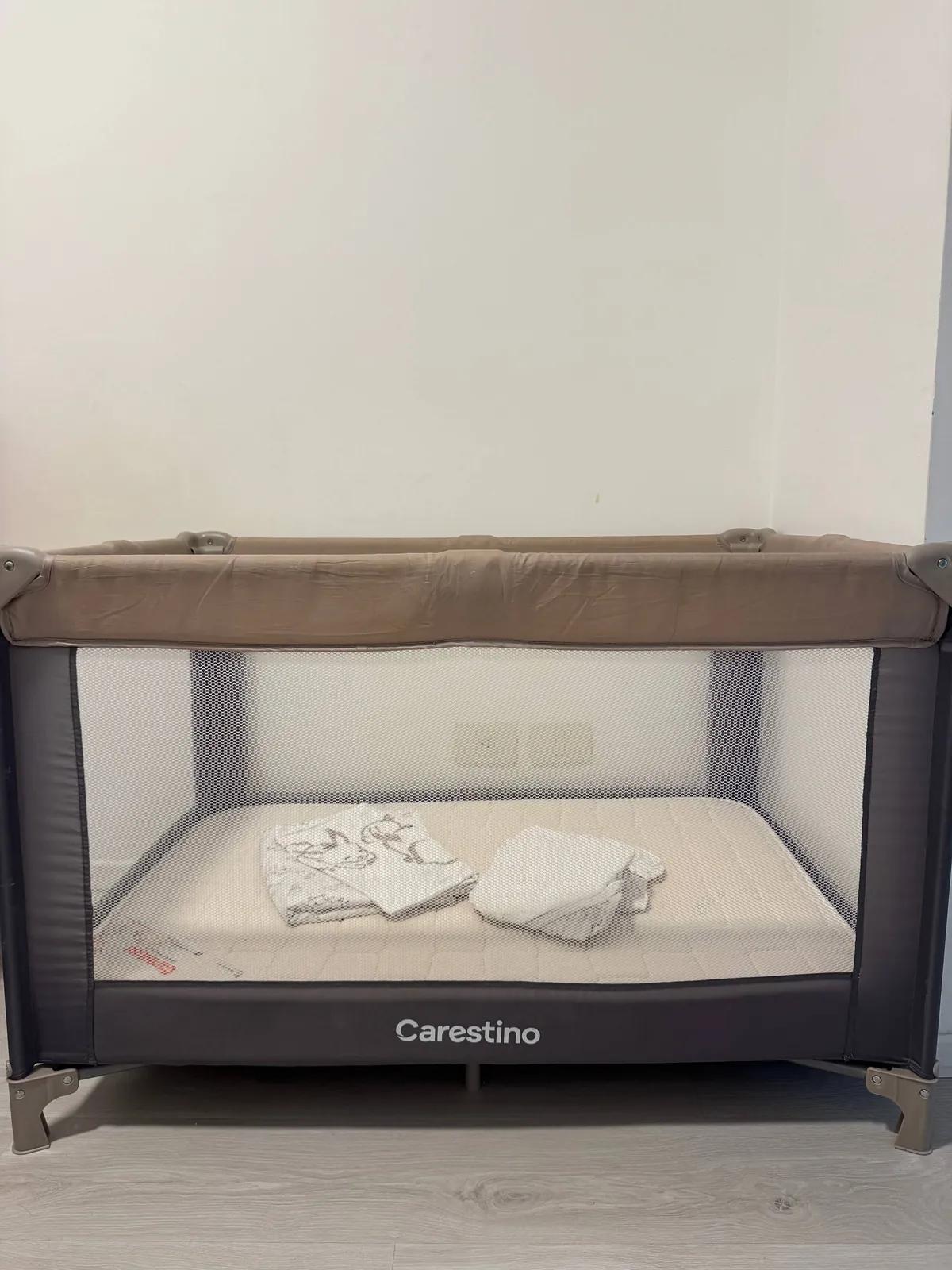 Кроватка-манеж Carestino с постельным IKEA