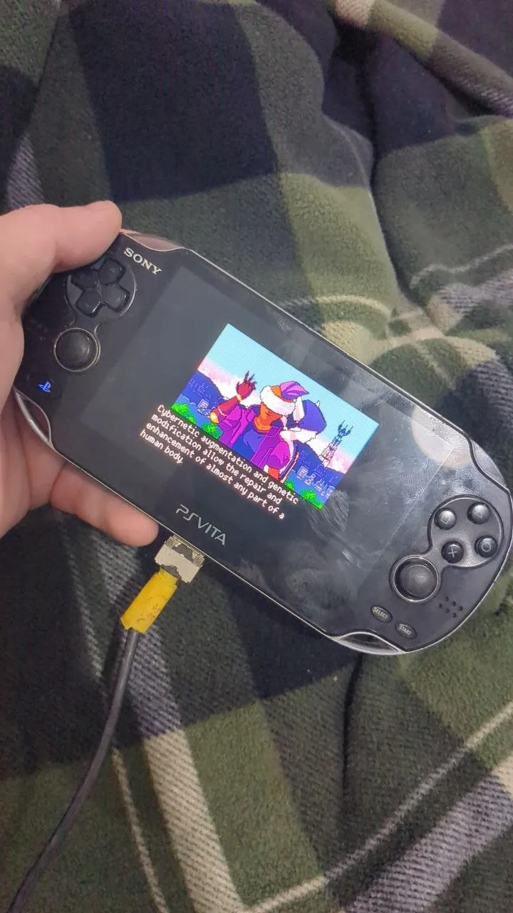 PlayStation Vita прошитая с играми и чехлом 2