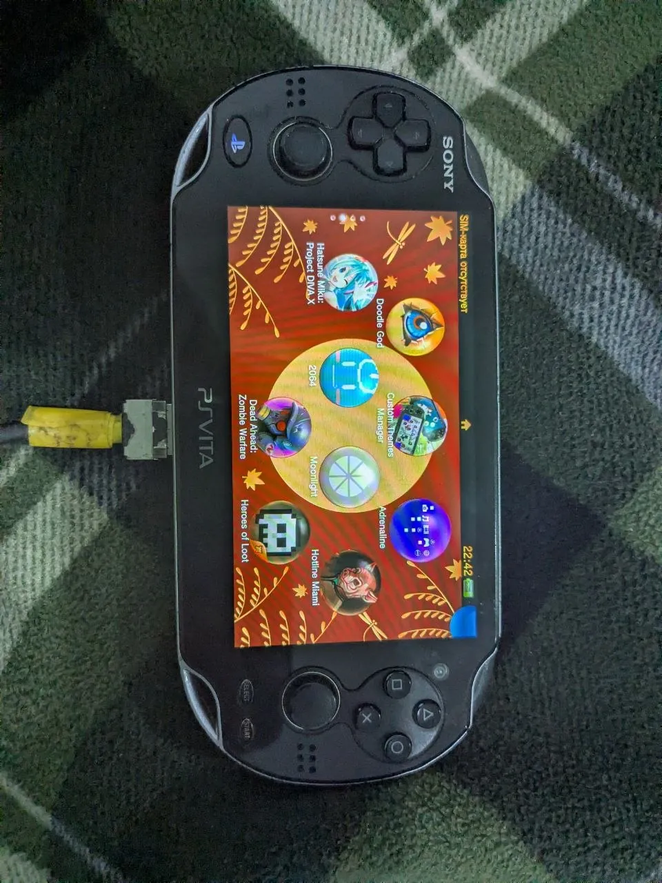 PlayStation Vita прошитая с играми и чехлом 1