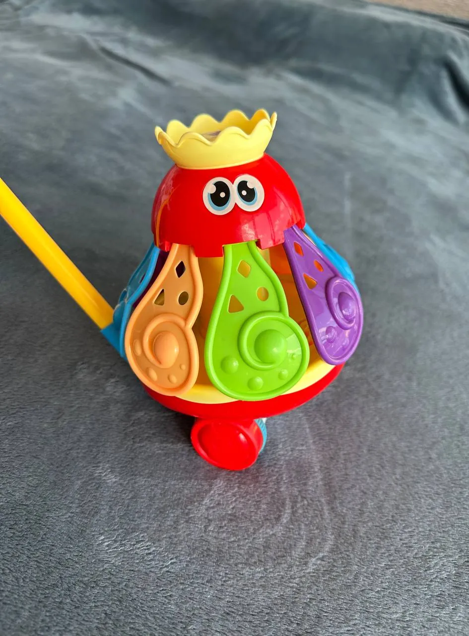 Игрушка-каталка детская 4